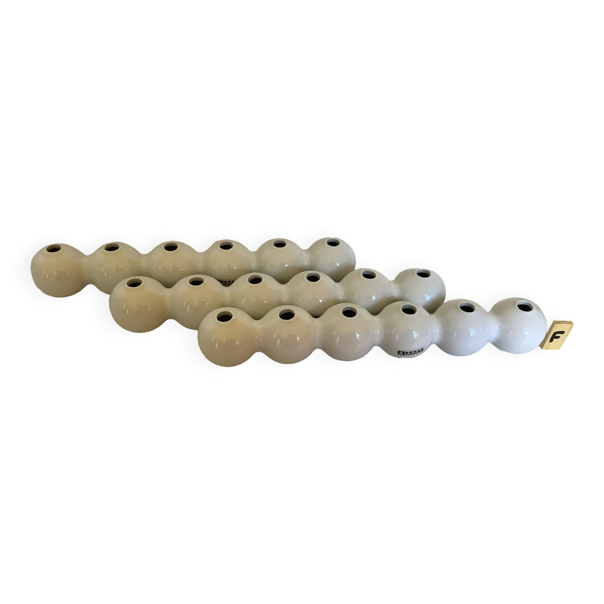 Three flower spikes caterpillar design René Barba Serax