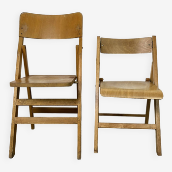 Pair of mismatched wooden folding chairs