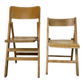 Pair of mismatched wooden folding chairs