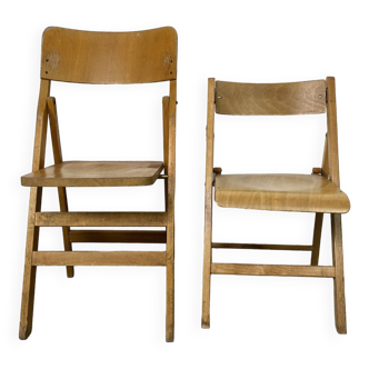 Pair of mismatched wooden folding chairs