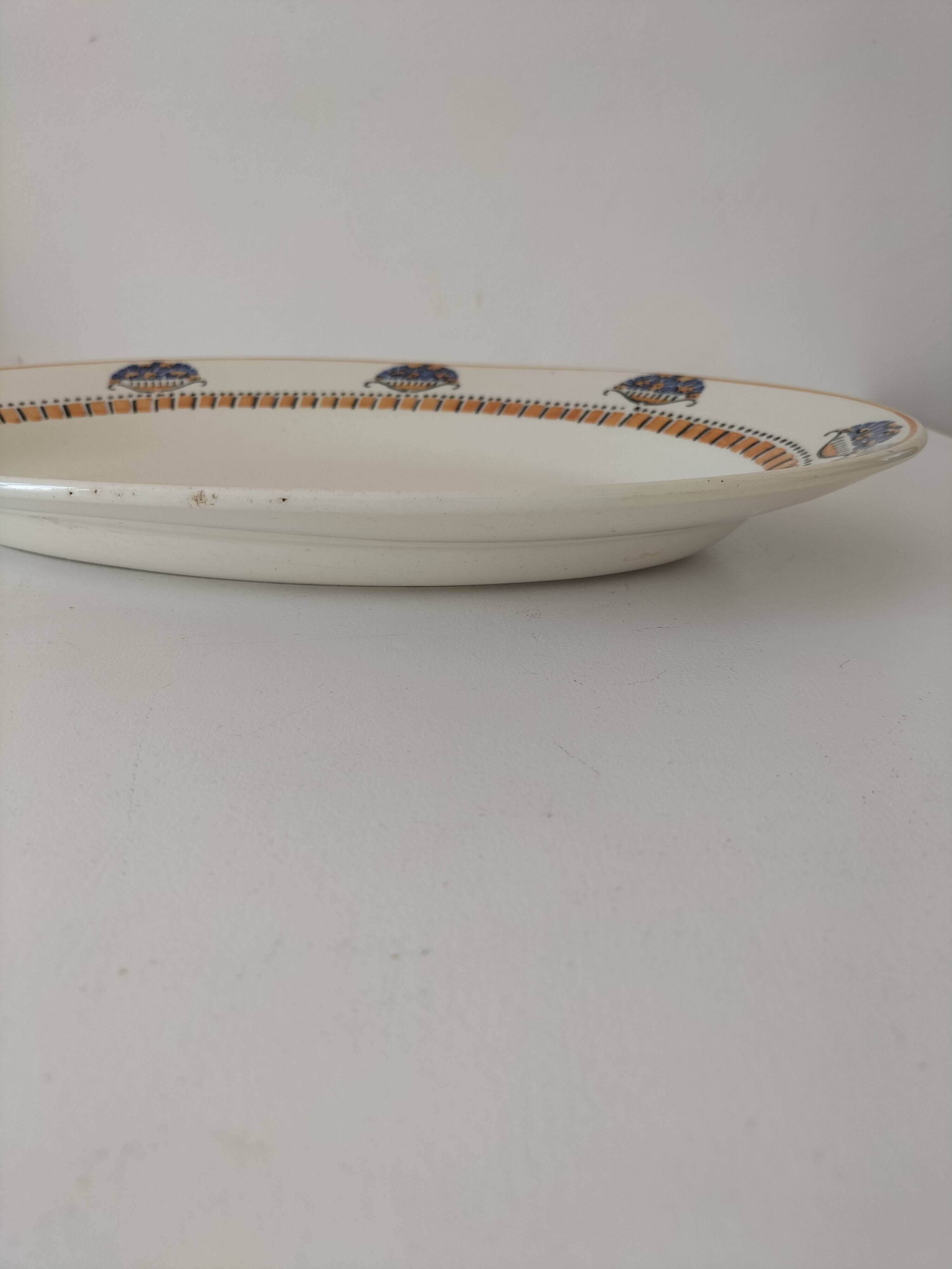 Oval Art Deco plate from Longwy pottery.