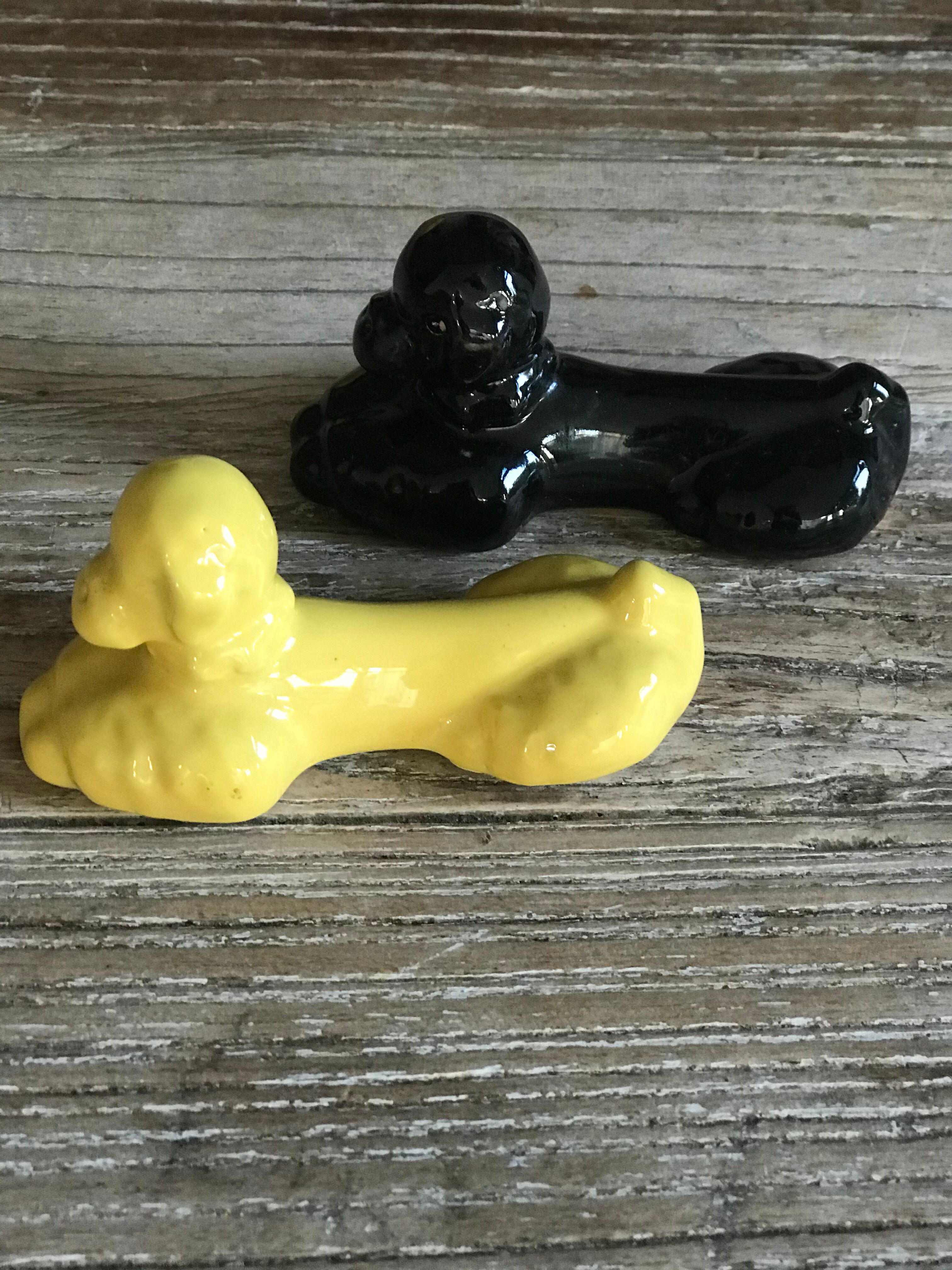 Lot of 12 vintage poodle-shaped knife holders