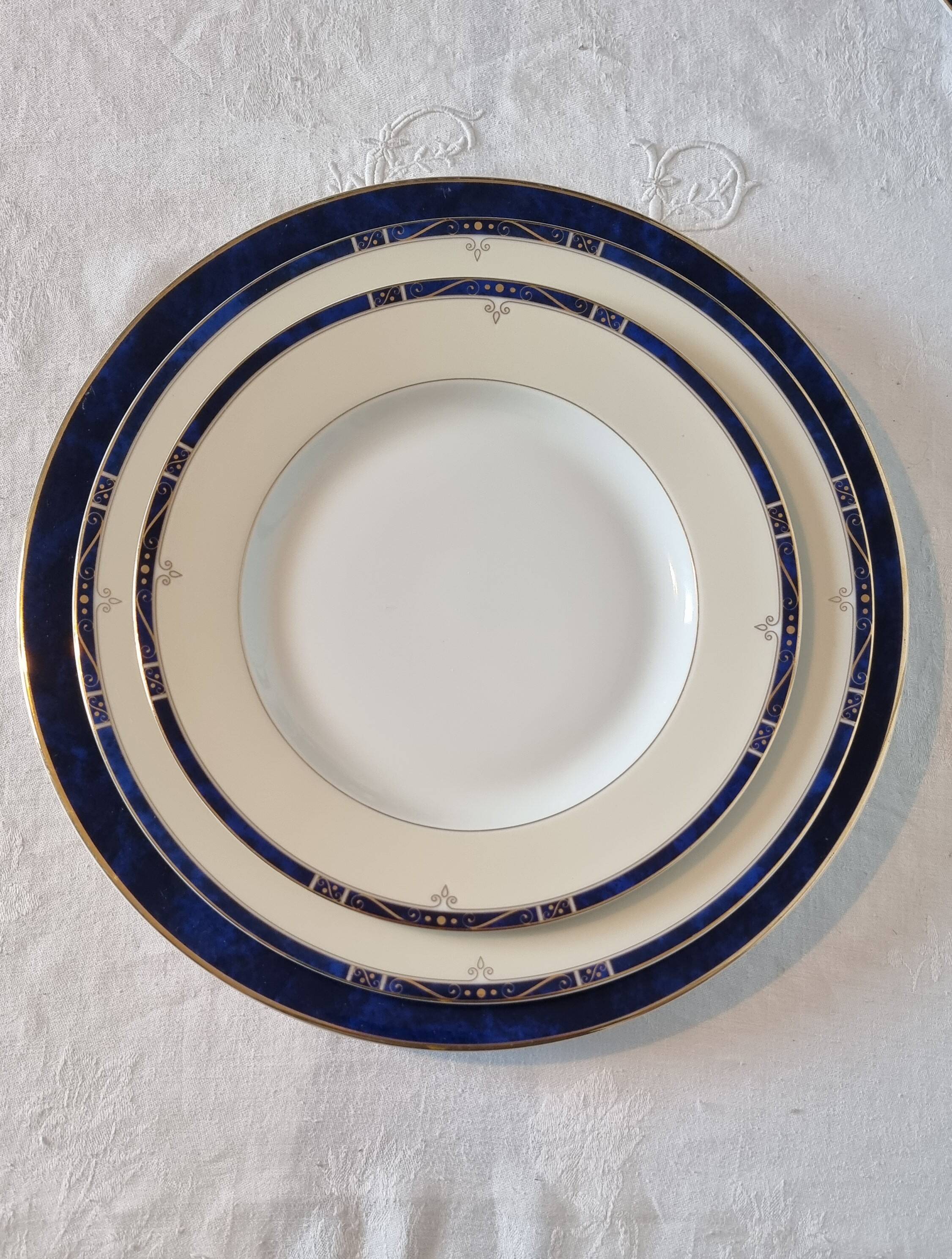 18-piece porcelain dinnerware set from Limoges by Philippe Deshoulières.