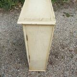 Solid beige wood cabinet with door drawers