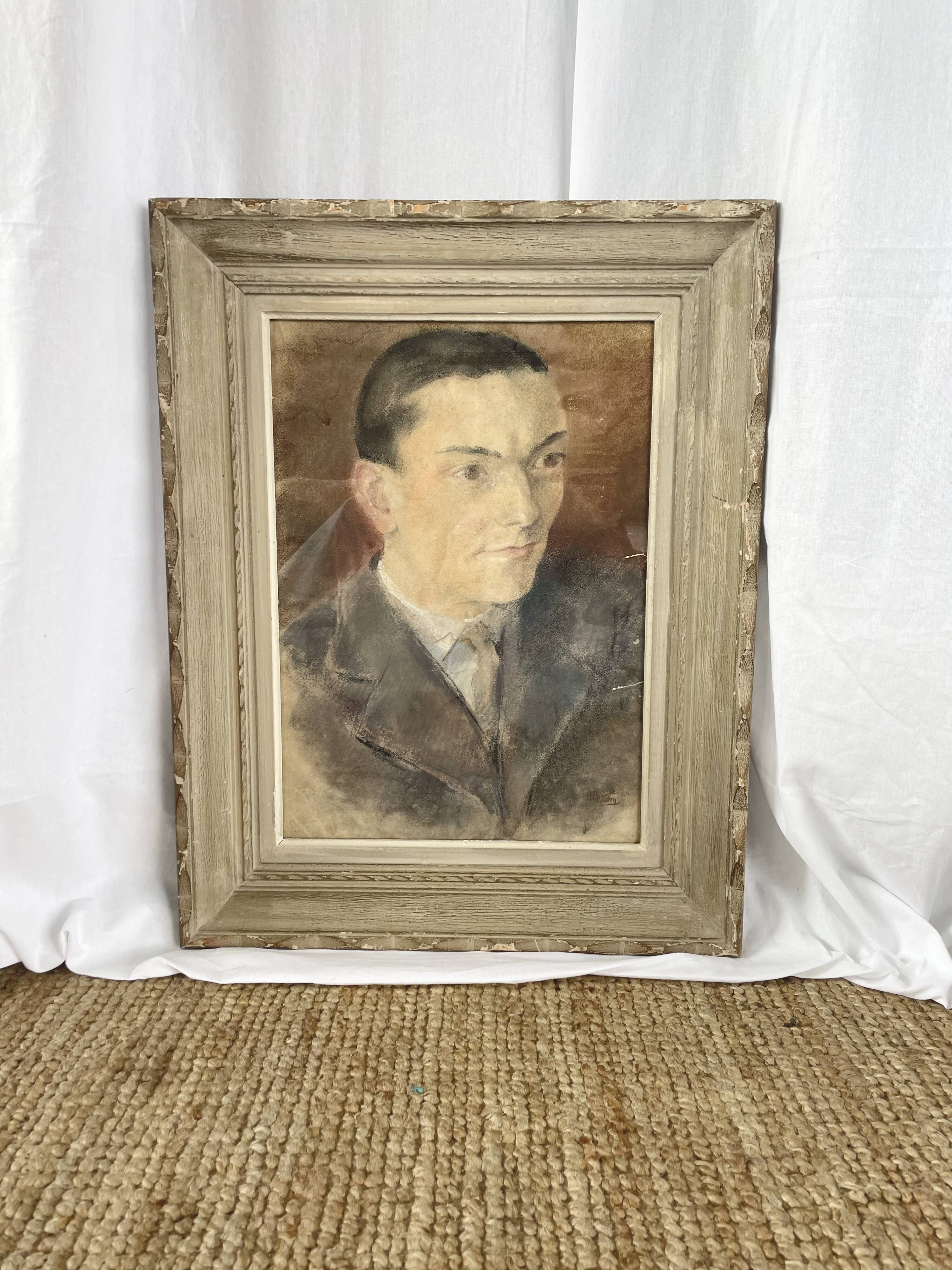 Portrait of a man in pastel under glass, signed, early 20th century.