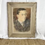 Portrait of a man in pastel under glass, signed, early 20th century.