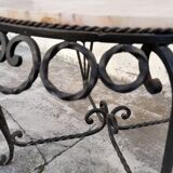 Round coffee table in wrought iron and on marble