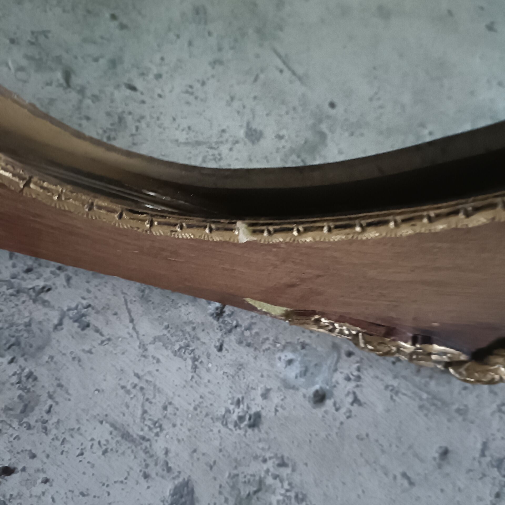 Oval and gold Art Deco mirror