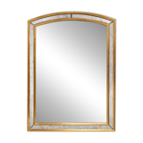 Mirror by Deknudt with marbled fume glass side panels in gilded wooden fram