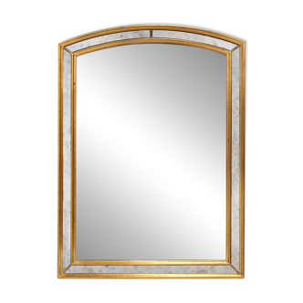 Mirror by Deknudt with marbled fume glass side panels in gilded wooden fram