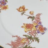 Round hollow Limoges dish with small yellow and purple flower patterns