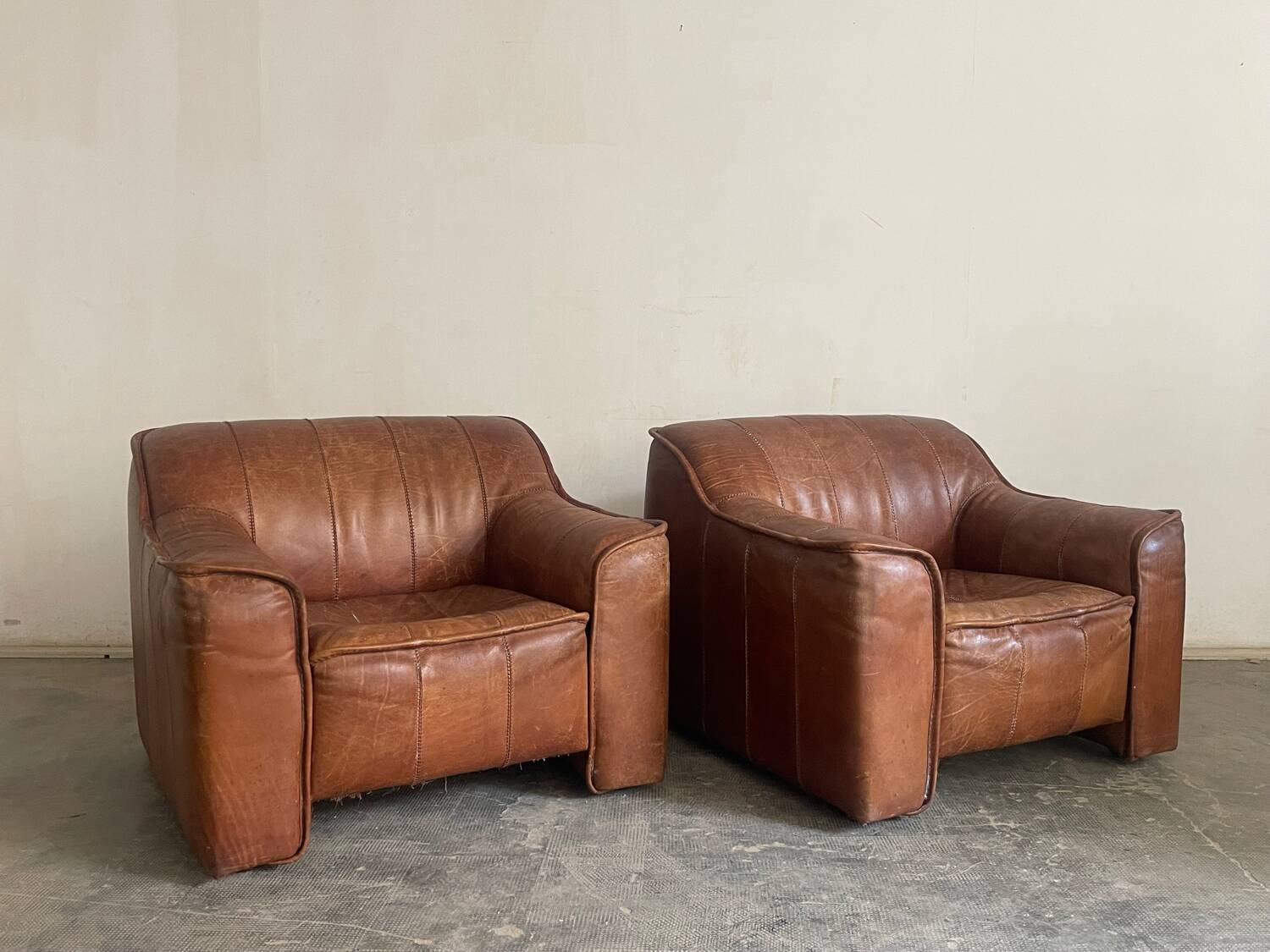 Pair of leather armchairs