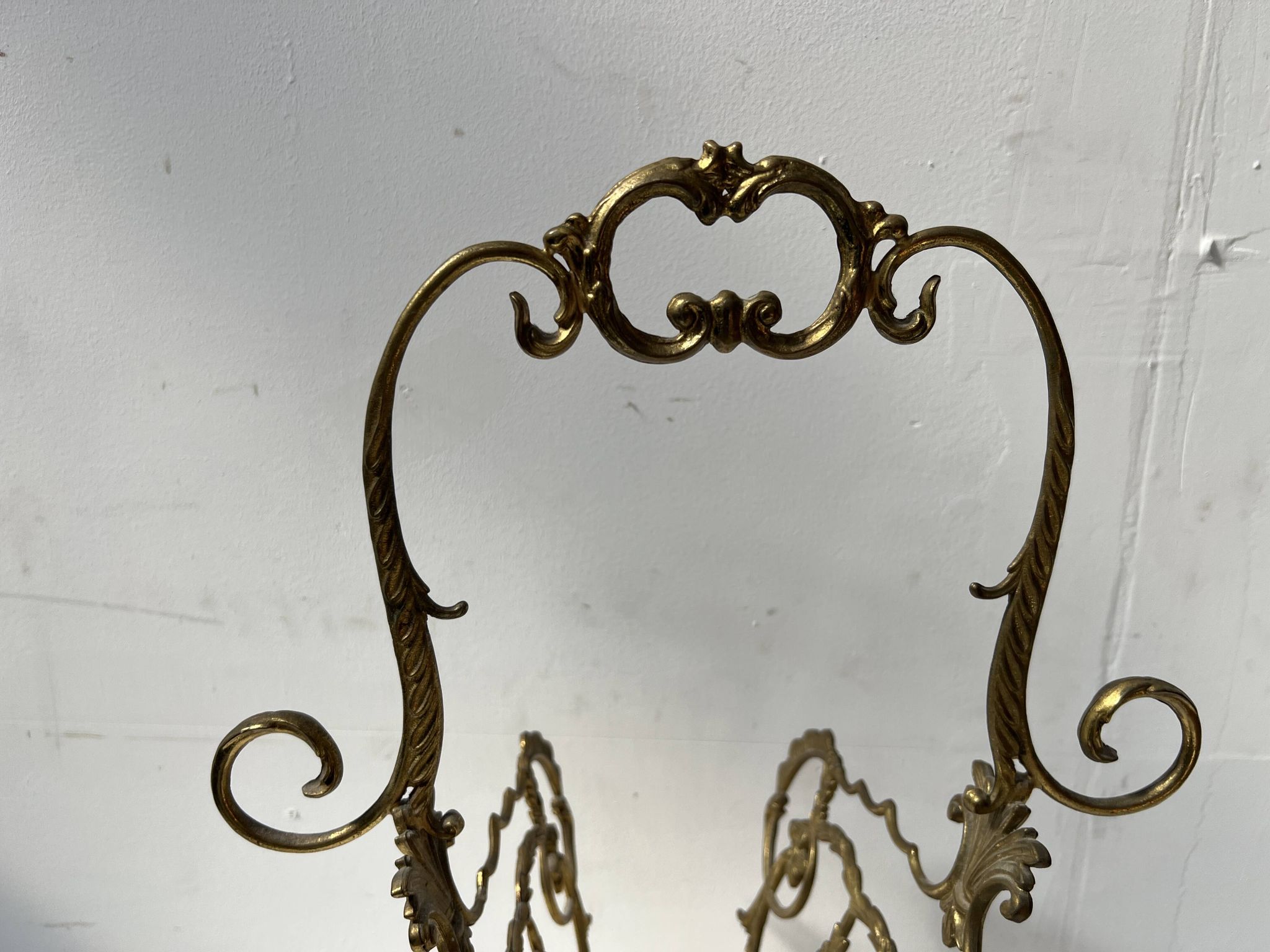 20th century openwork bronze and brass magazine rack