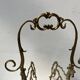 20th century openwork bronze and brass magazine rack