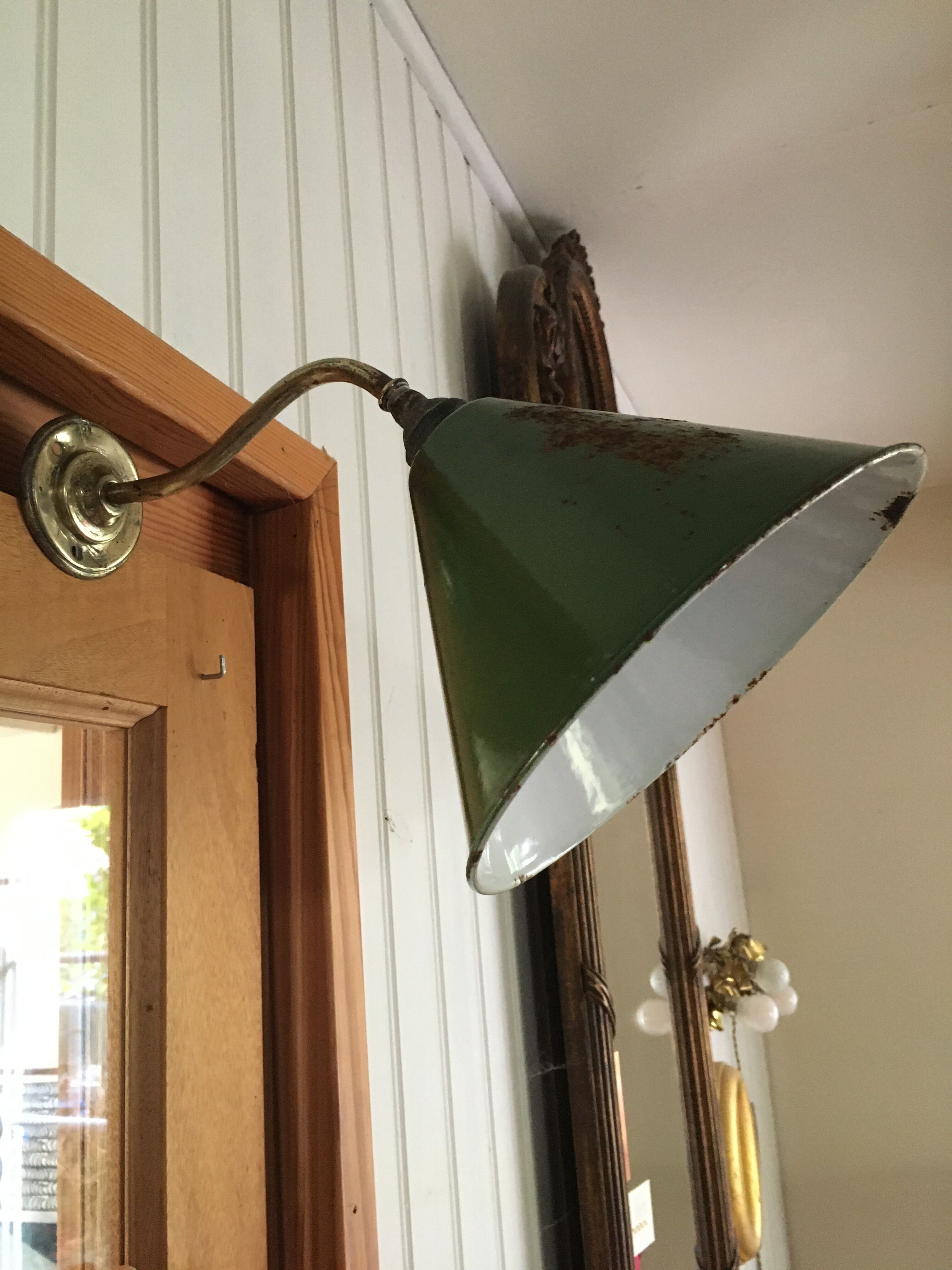 Enamelled sheet metal wall light