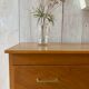 Commode aux pieds compas