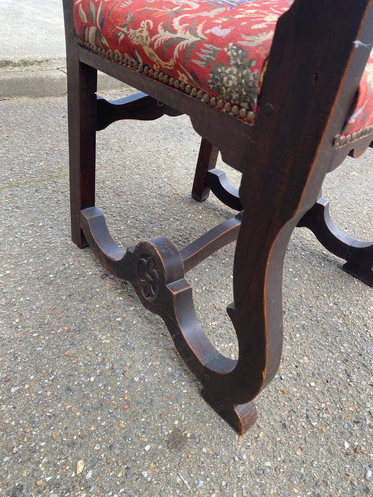 Henri II armchair in solid wood and floral burgundy fabric, 19th century.