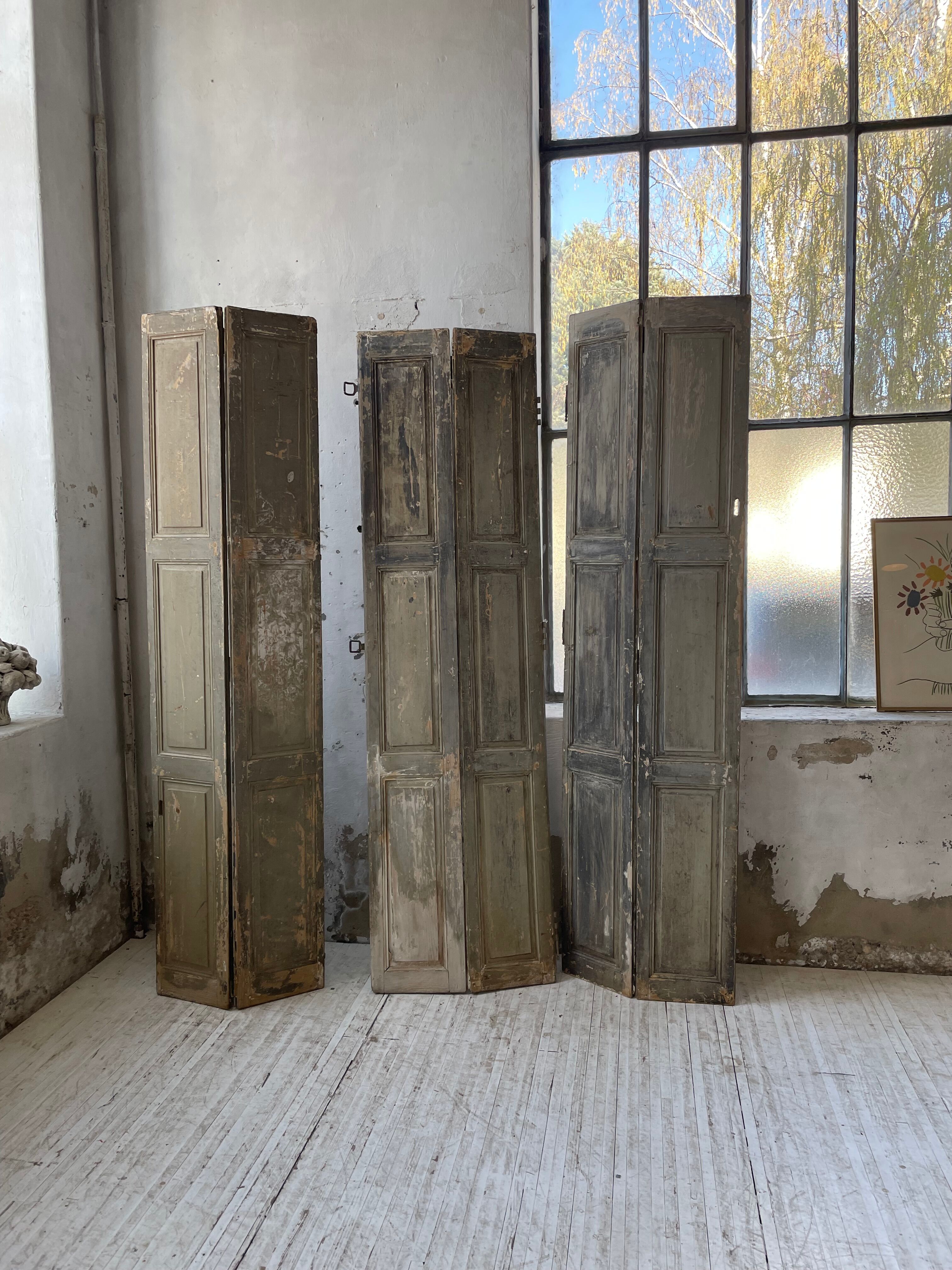 Trio of shutters louvers patina blue gray