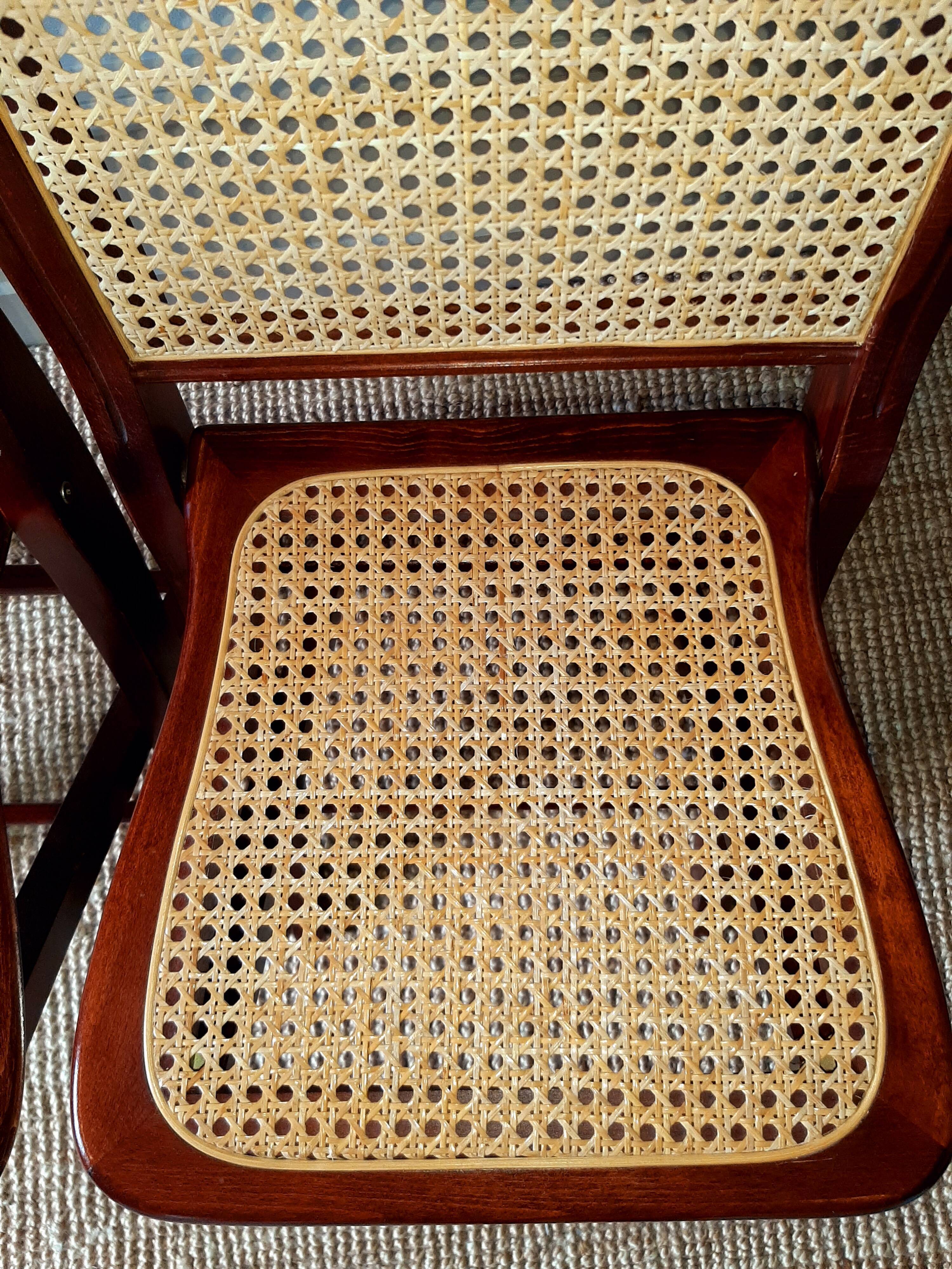 Folding wooden chairs and cannage