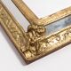 Medium vintage mirror with a decorative gold and blue metal frame, Italy, 1960s.