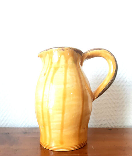 Set of art nouveau ceramic pitchers