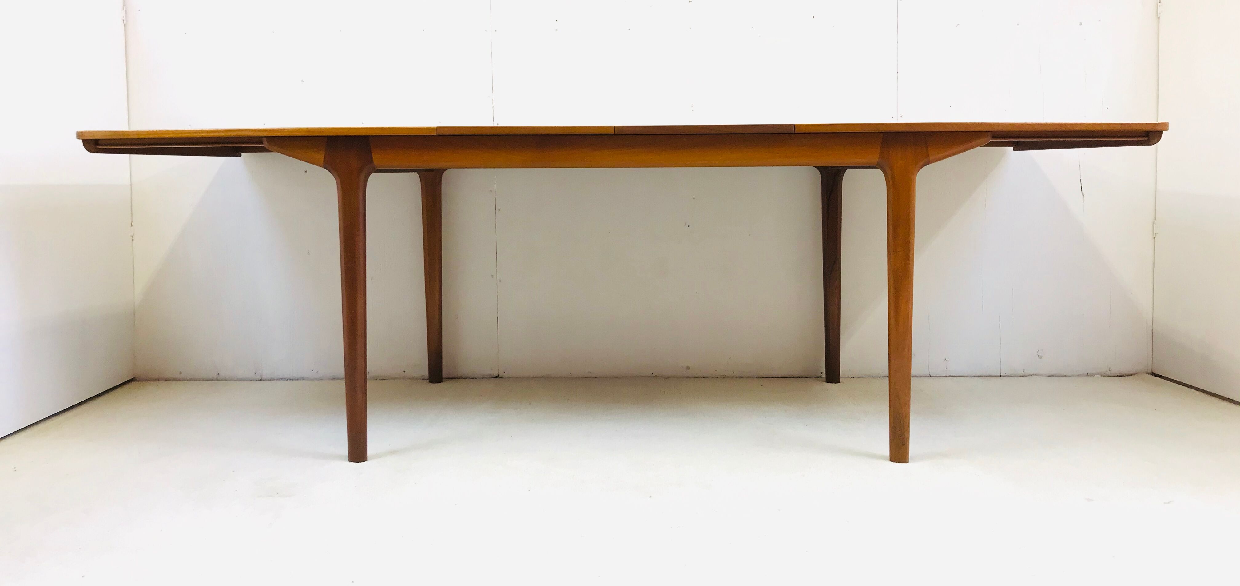 McIntosh extending teak table designed by Tom Robertson 60’s