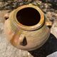 Ancient terracotta pottery jar