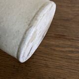 Stoneware bottle tilted at an angle, early 20th century