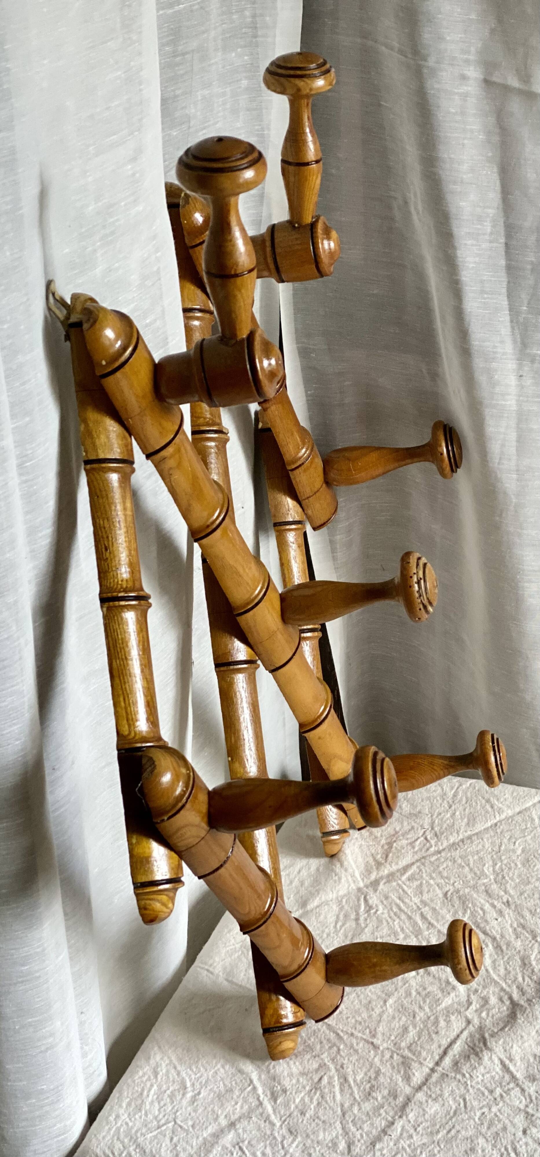 19th century turned wood accordion coat rack.