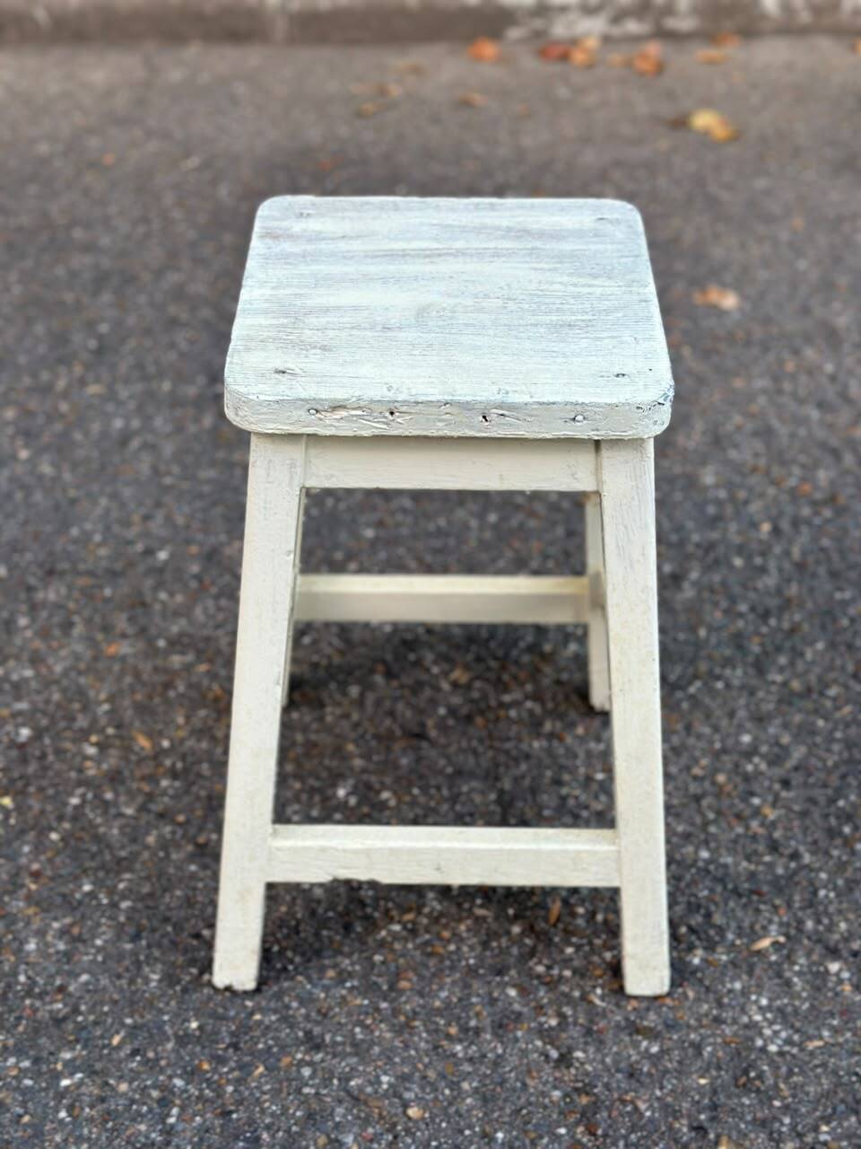 Rustic square farmhouse stool in patinated white wood from the 1960s.