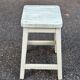 Rustic square farmhouse stool in patinated white wood from the 1960s.