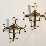 Pair of gilded metal sconces decorated with clovers.