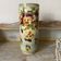 Large tubular vase in Choisy-le-Roi earthenware, decorated with pansies.
