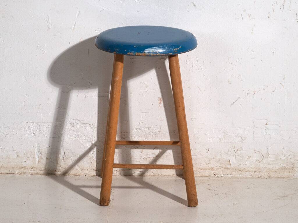 Antique wooden stool with a round seat – Central Europe, around 1950
