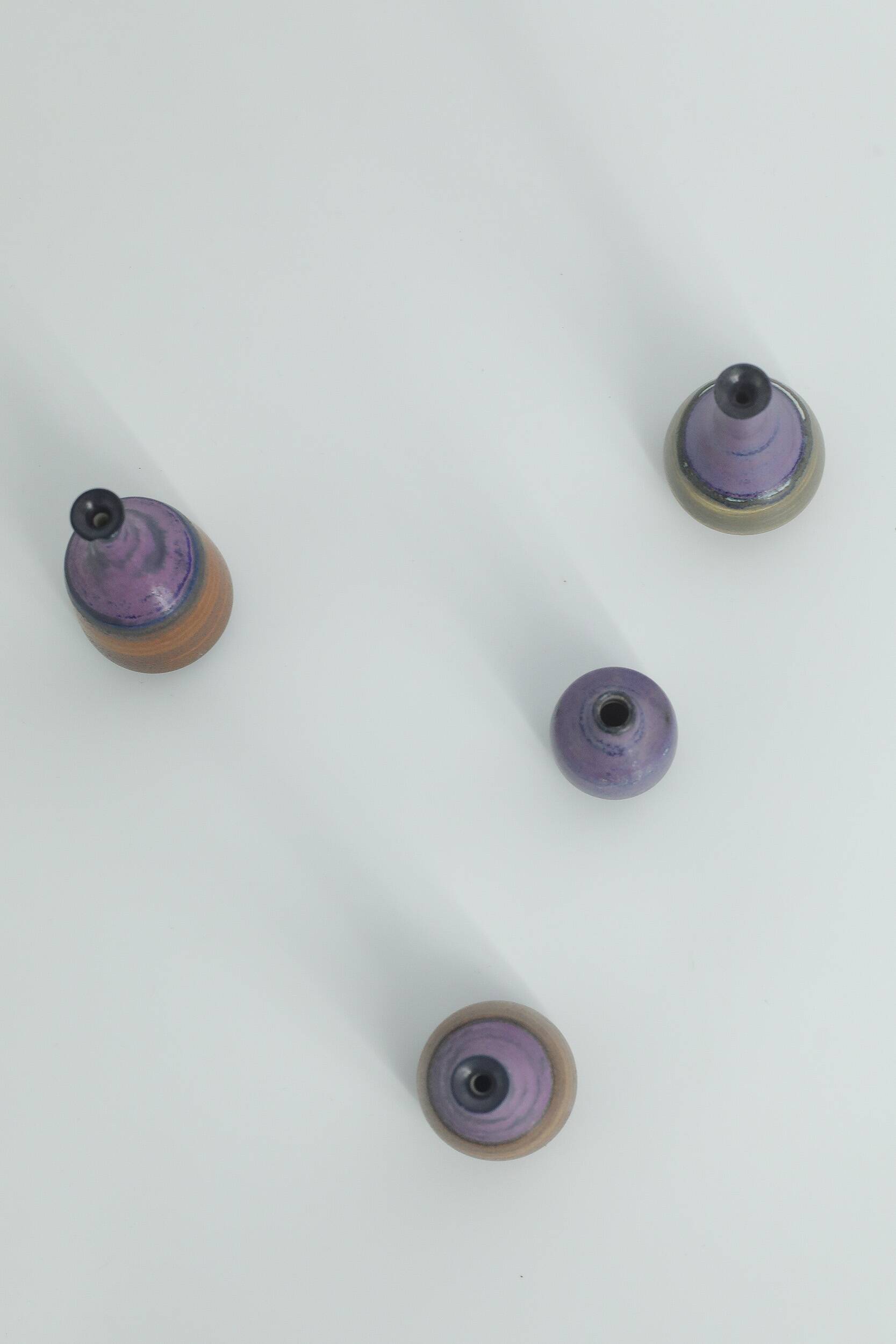 Small mid-century modern collection vases in brown and purple stoneware by Gunnar Borg, Sweden, set of 4.