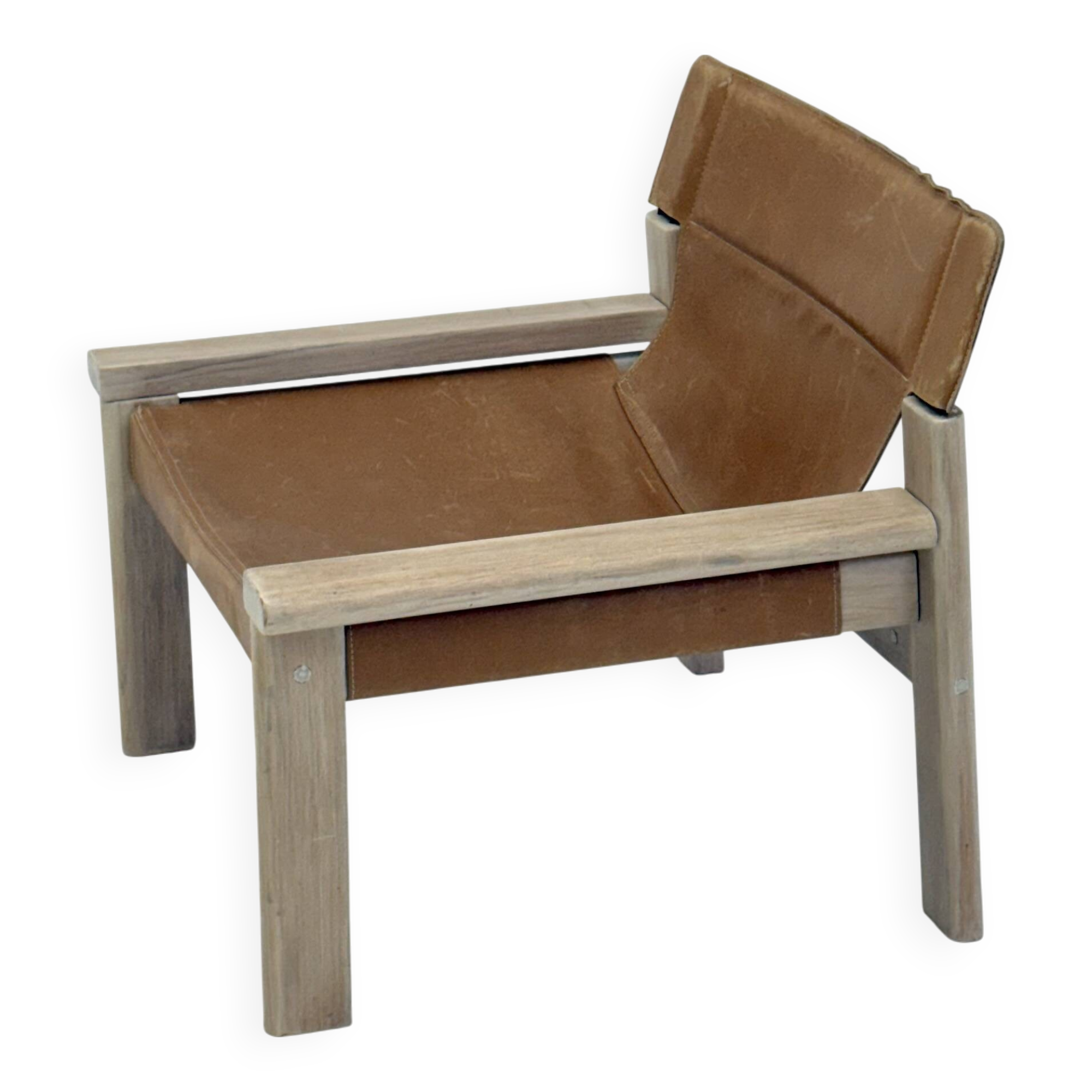 Stylish vintage armchair with saddle leather seat