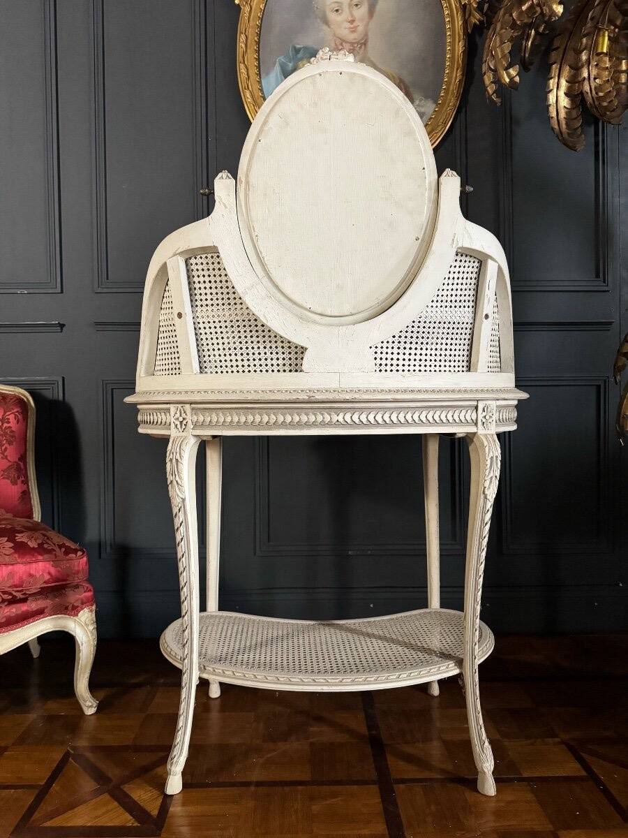 Coiffeuse du XIXe en bois peint et cannage de style Louis XVI