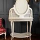 Coiffeuse du XIXe en bois peint et cannage de style Louis XVI