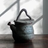 Homemade teapot in pyrity sandstone