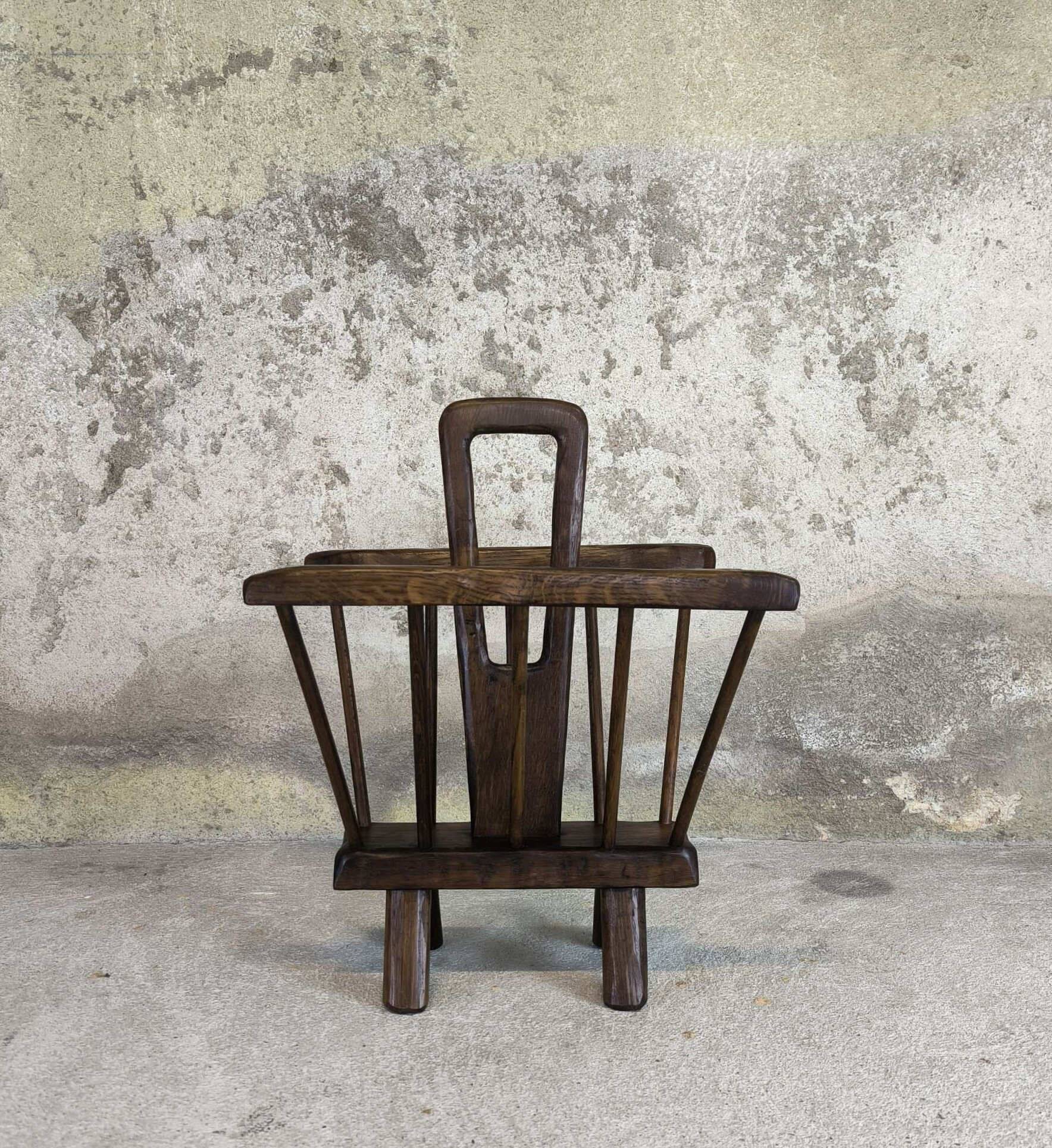 Vintage magazine rack in solid wood.