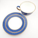 Antique Wedgwood teacup and saucer, bone china. Powder blue and gold English footed cup and saucer,