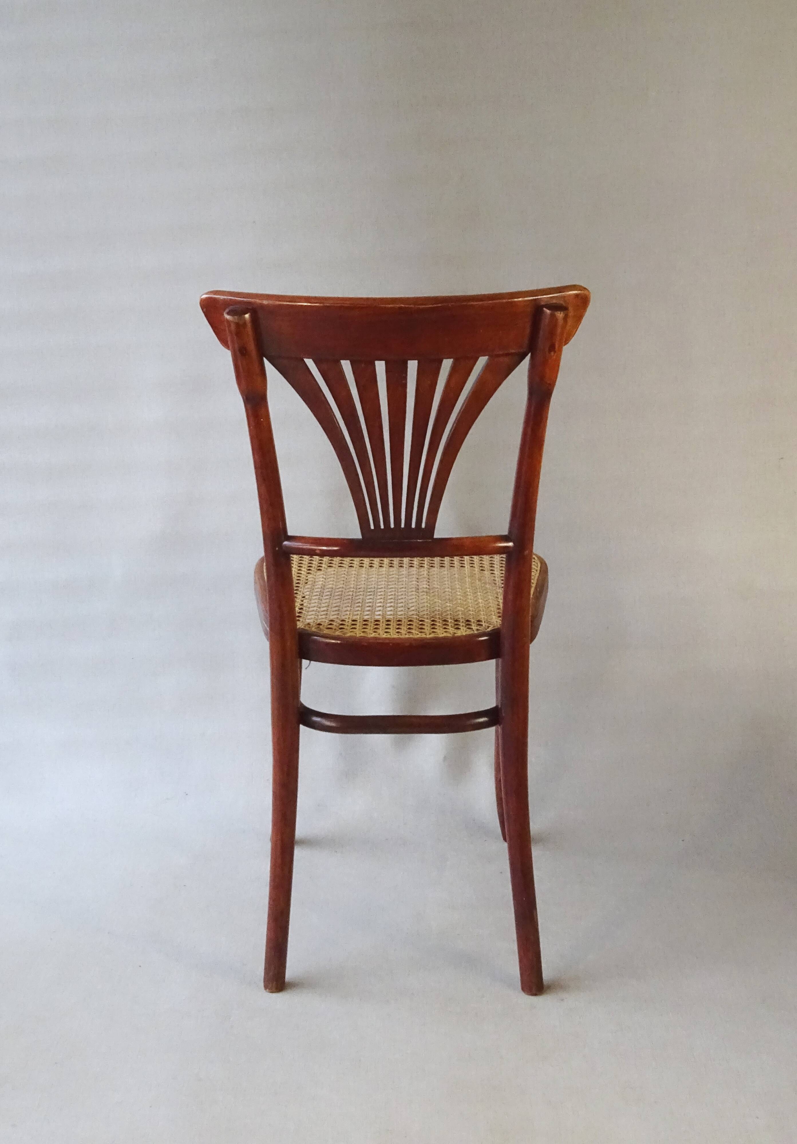 2 Thonet N°221 chairs, caned Art Nouveau bronze decor