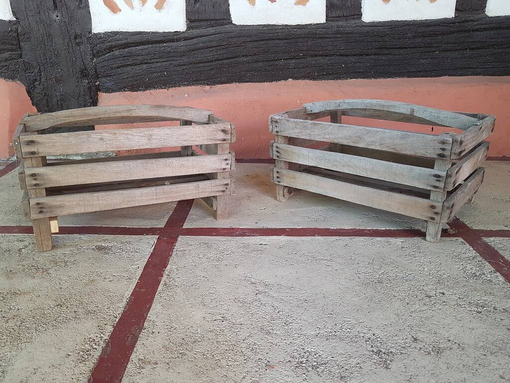 Pair of old fruit crates with wooden shelves