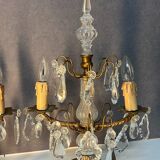 Pair of antique chandeliers, in brass with cut glass pendants, early 20th century