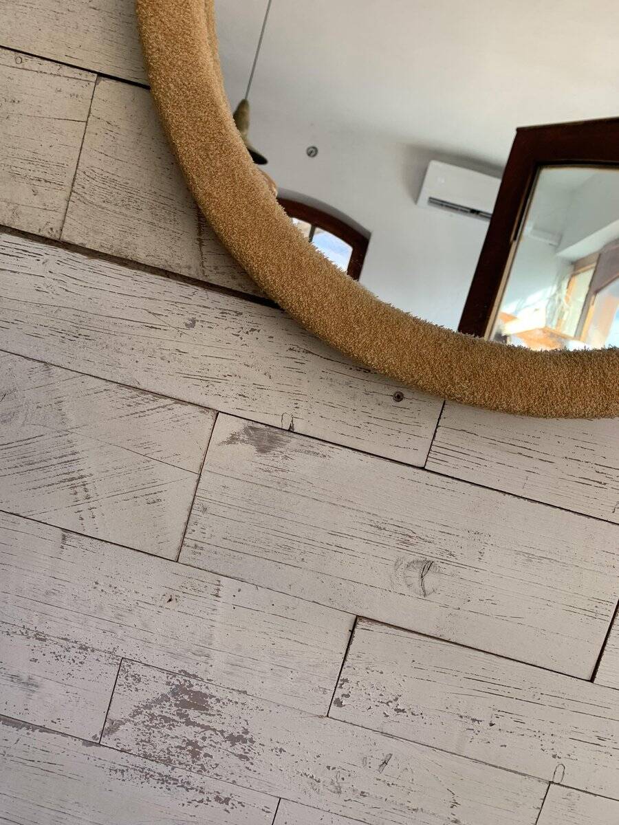 Vintage 1950s round wall mirror, wooden frame and mirror, yellow finish.