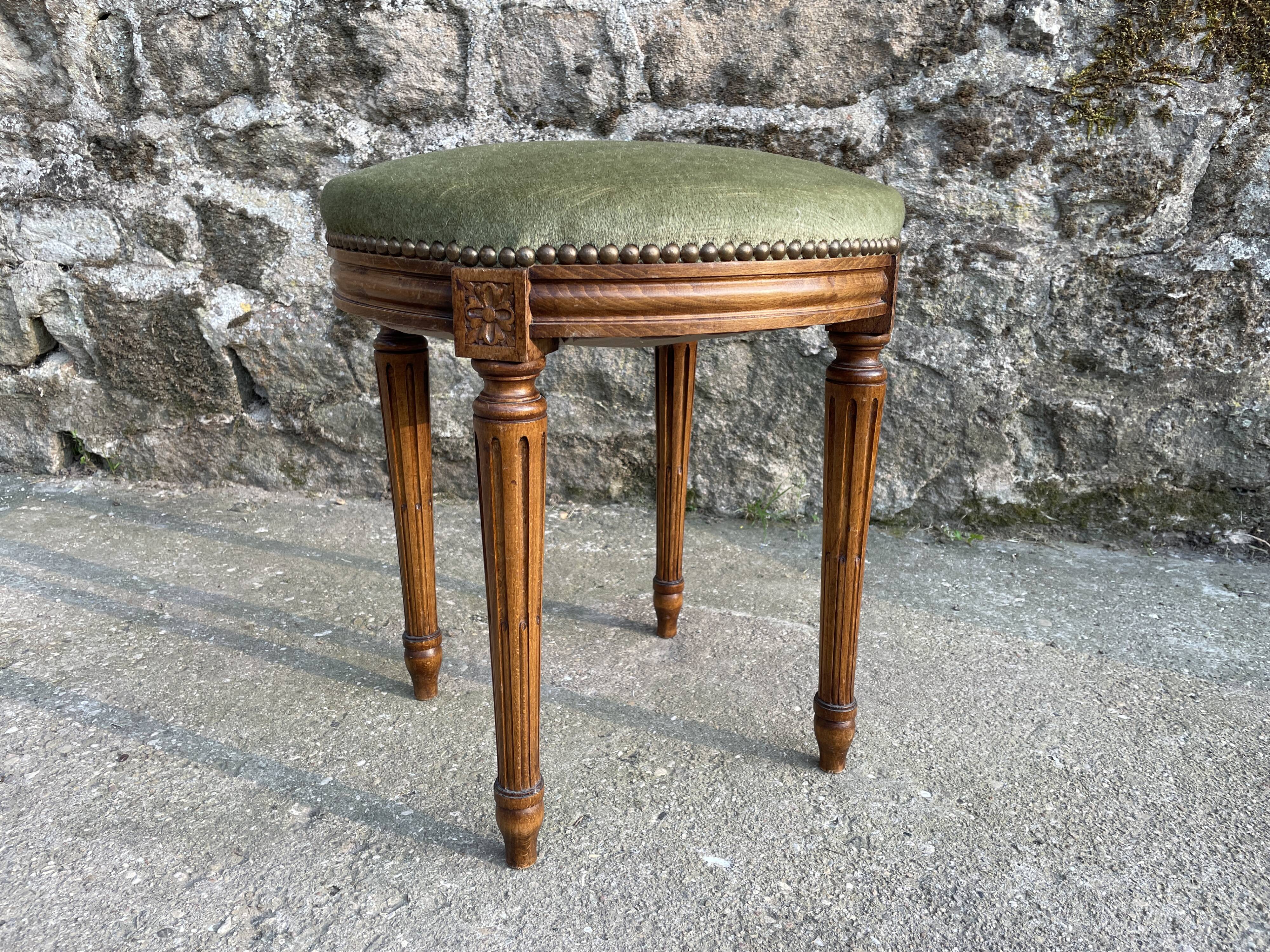 Almond green velvet footrest stool