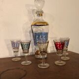Liquor carafe and 6 assorted glasses