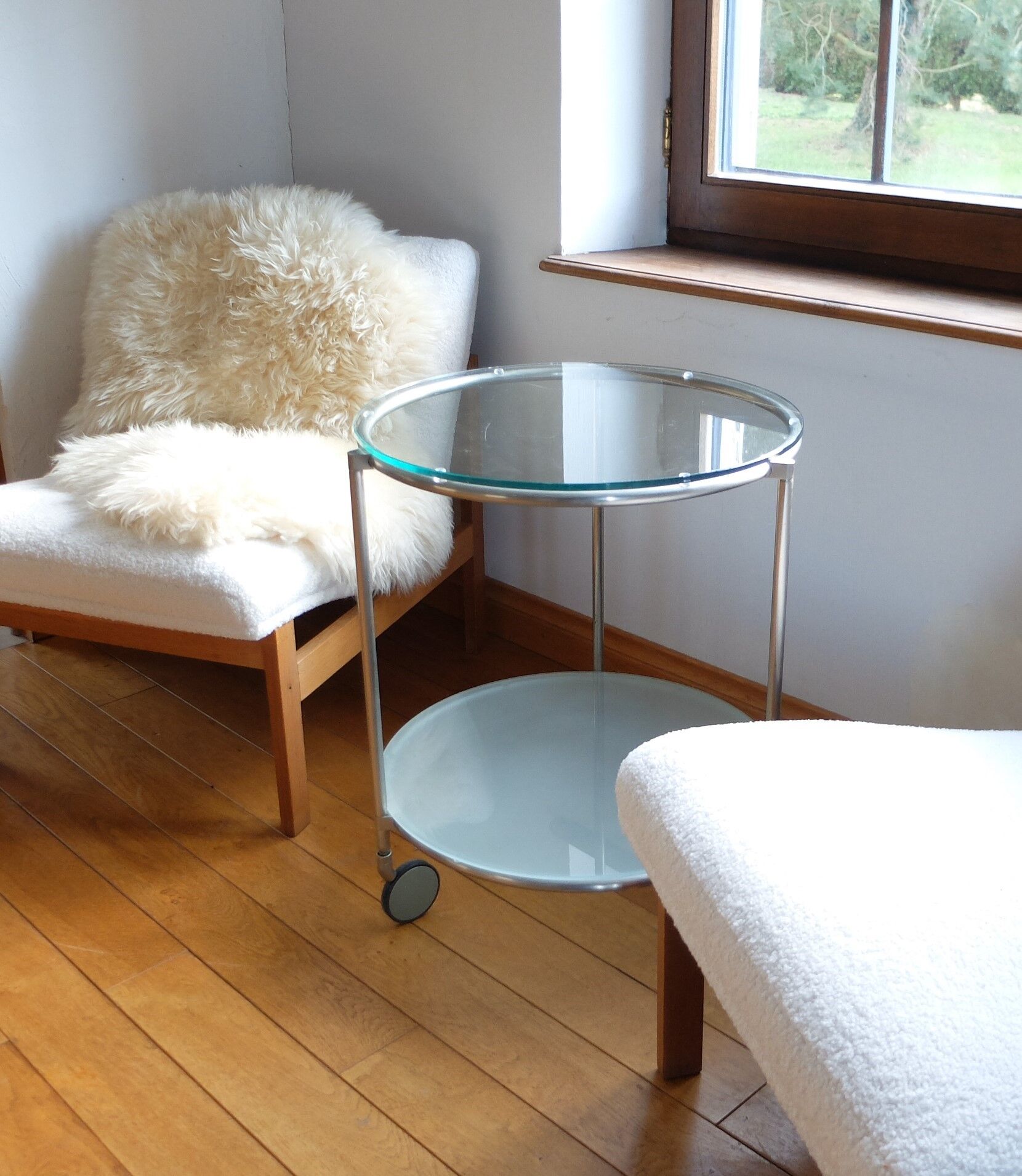 1970s stainless steel pedestal table with two glass tops