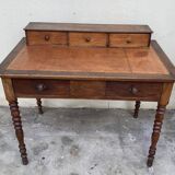 Antique desk with leather top and turned legs, 98 x 60.