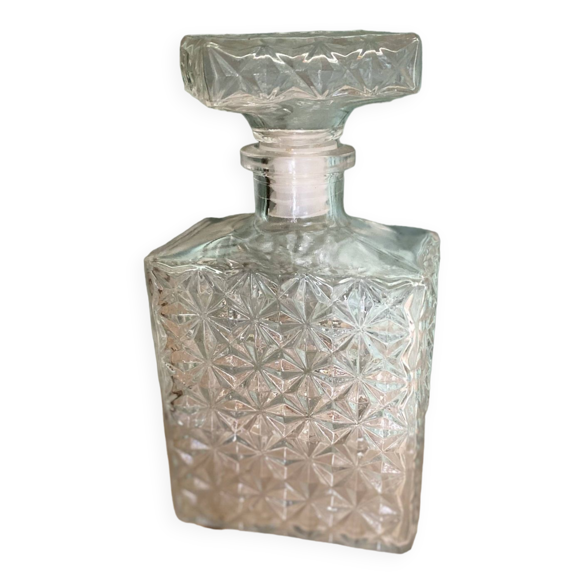 Old molded glass whiskey bottle